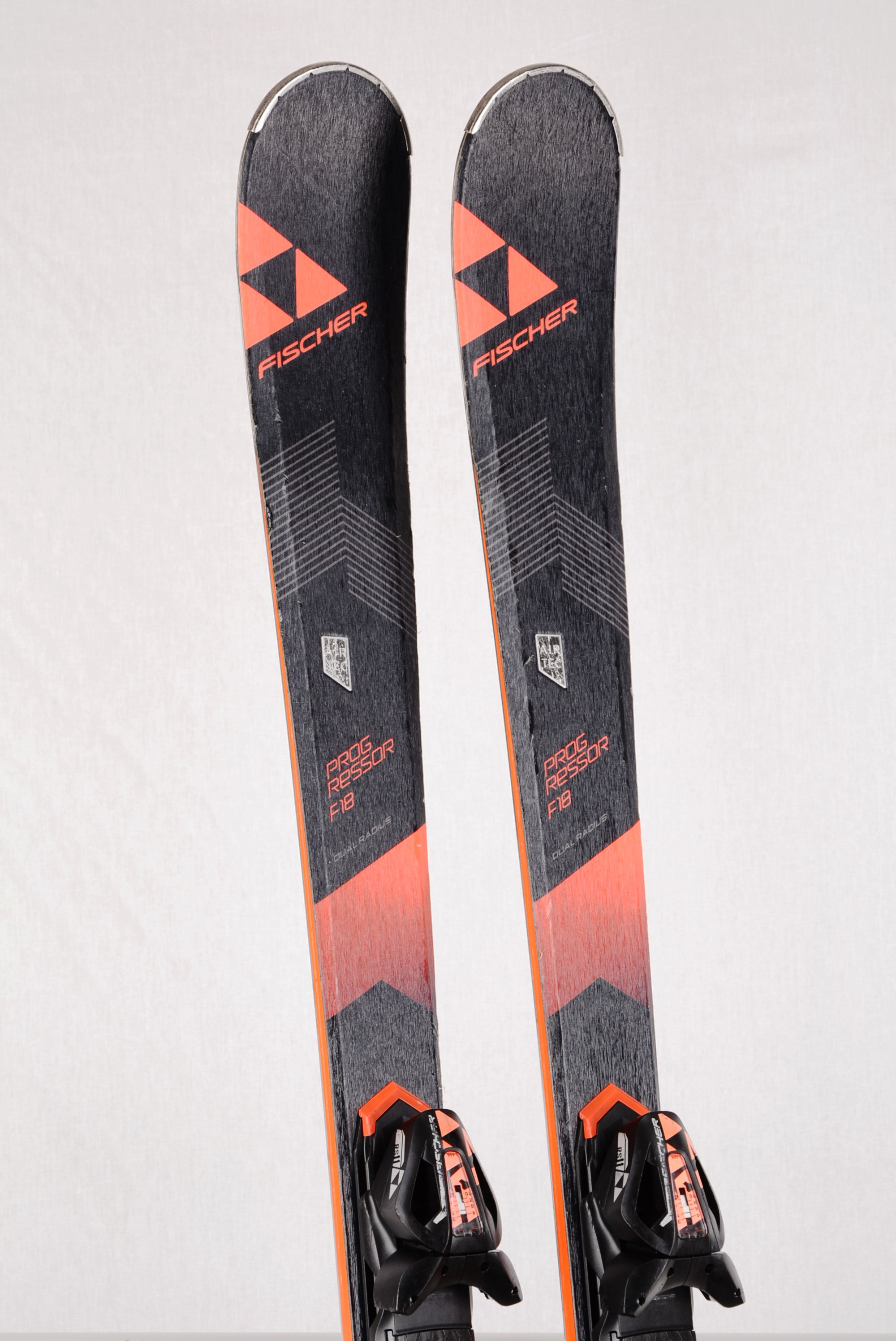 skis FISCHER PROGRESSOR RAZORSHAPE, AIR TEC, DUAL radius, woodcore, carbon + Fischer RS 11 -